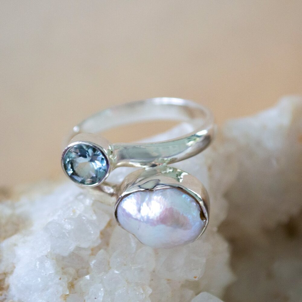 Elegant White Pearl and Blue Topaz Sterling Silver Ring